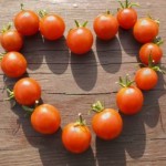 1197555_sign_of_love_-_heart_made_from_small_tomatoes